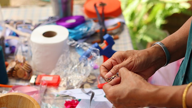 hands sewing machine fabric